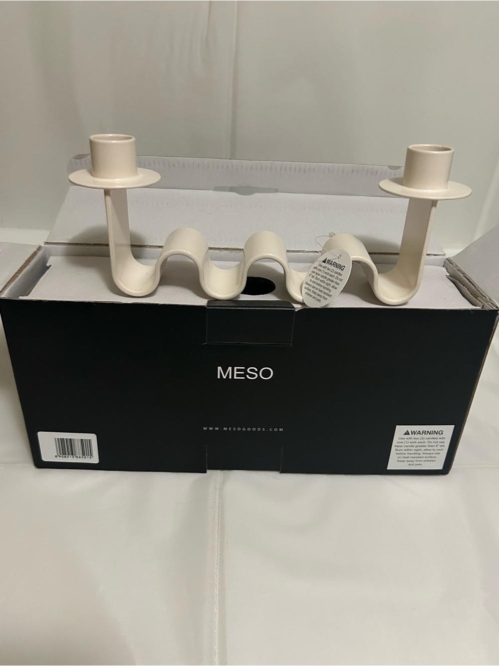 New in box. Meso wavy white candle holder.